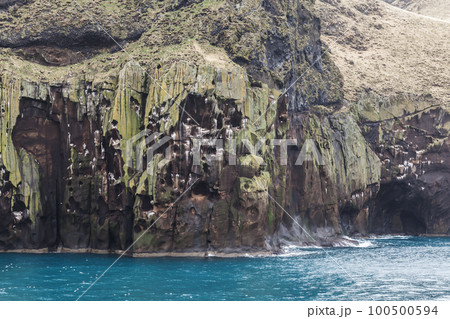 Rocky coast of the Vestmannaeyjar island, Iceland Rocky coast of the Vestmannaeyjar island, Iceland 100500594