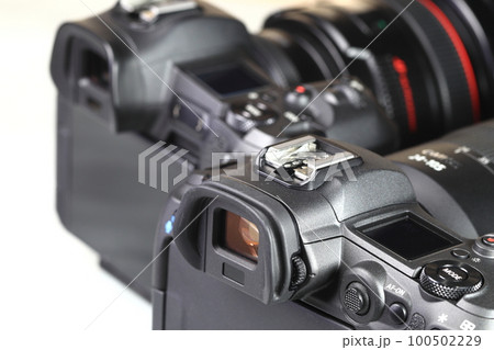 collection of professional DSLR camera body with lens isolated on white background. collection of professional DSLR camera body with lens isolated on white background. 100502229