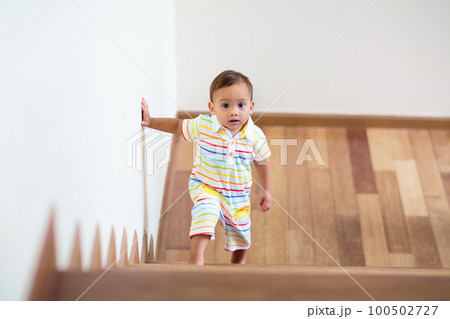 Kids on stairs. Child moving into new home. 100502727