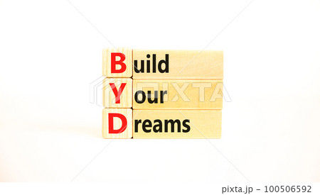 BYD build your dreams symbol. Concept words BYD build your dreams on wooden blocks on a beautiful white table white background. Business and BYD build your dreams concept. Copy space. BYD build your dreams symbol. Concept words BYD build your dreams on wooden blocks on a beautiful white table white background. Business and BYD build your dreams concept. Copy space. 100506592