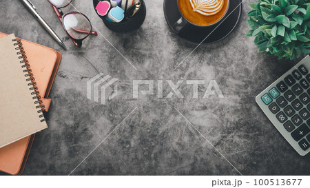 Modern office desk workplace with calculator, notebook, eyeglass, pen and cup of coffee, Top view flat lay with copy space. Modern office desk workplace with calculator, notebook, eyeglass, pen and cup of coffee, Top view flat lay with copy space. 100513677