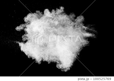 White powder explosion cloud against black background. White dust particles splash. White powder explosion cloud against black background. White dust particles splash. 100525769