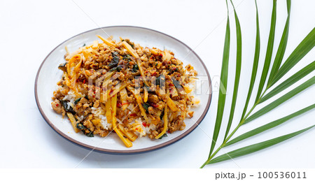 Rice with spicy stir fried pork with holy basil and preserved bamboo shoot Rice with spicy stir fried pork with holy basil and preserved bamboo shoot 100536011