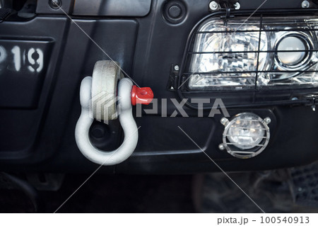 Close up view of fire truck. Particle view of front part. Headlights is off Close up view of fire truck. Particle view of front part. Headlights is off 100540913