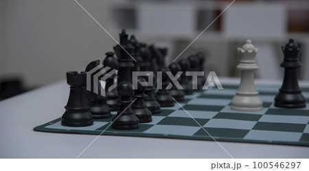 chess pieces on the white surface..Game of Chess. Close Up Playing Chess Game , Success Strategy. 100546297