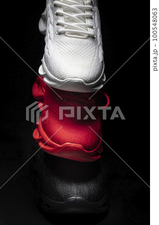 Vertical black red and white sneakers. Vertical black red and white sneakers. 100548063
