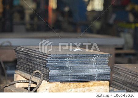 Sheets of metal and blanks in the workshop of a metallurgical plant or a metal working enterprise. Sheets of metal and blanks in the workshop of a metallurgical plant or a metal working enterprise. 100549010