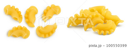 Pasta cornetti creste macaroni isolated on white background with full depth of field. Top view. Flat lay Pasta cornetti creste macaroni isolated on white background with full depth of field. Top view. Flat lay 100550399