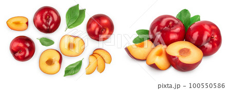 fresh red plum and half isolated on white background. Top view. Flat lay. Set or collection 100550586