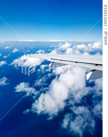 Cloudy sky from porthole 100550918