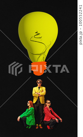 Contemporary art collage of big light bulb over three employees, symbolizing successful teamwork, cooperation deal. Vertical layout 100552241