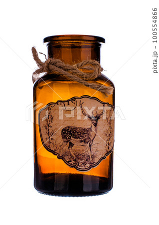 Brown glass bottle on white background 100554866