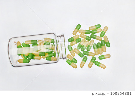 One semi-transparent bottle with capsules One semi-transparent bottle with capsules 100554881