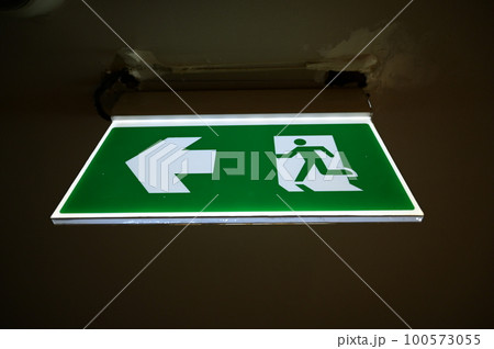 exit symbol for warning people, green light exit symbol for warning people, green light 100573055