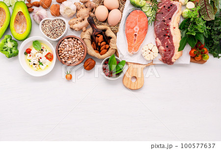 Ketogenic low carbs diet concept. Ingredients for healthy foods selection set up on white wooden background. 100577637