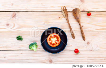 Food background and salad concept with raw ingredients flat lay on white wooden background. Food background and salad concept with raw ingredients flat lay on white wooden background. 100577641