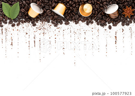Dark roasted coffee beans setup on white background with copy space. 100577923