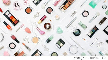 Feminine makeup aqua mente and pink palette accessories with nail polish manicure tools on white background. Flat lay pattern full frame knolling, beauty and cosmetics blogger concept banner 100580917