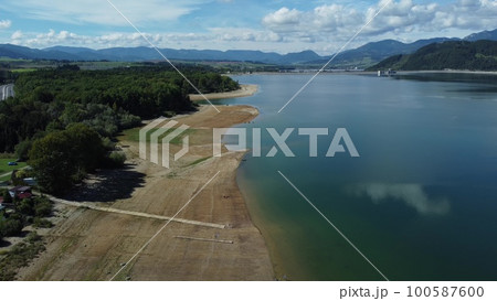 Aerial view of Liptovska Mara reservoir in Slovakia. Water surface Aerial view of Liptovska Mara reservoir in Slovakia. Water surface 100587600