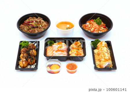 Set of Japanese food, pork rice, salmon pickle, salmon sushi rolls, and takoyaki or squid balls on white background. 100601141