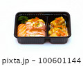 Various kinds of salmon sushi in a plastic tray on white background 100601144