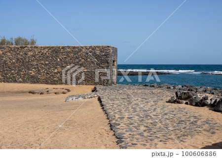 Historical building and Atlantic ocean, Fuerteventura 100606886