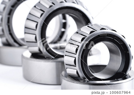 roller bearing on a white background close-up, blur as an artistic device 100607964