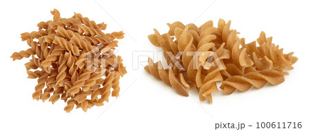 Wolegrain fusilli pasta from durum wheat isolated on white background with full depth of field. Top view. Flat lay. Wolegrain fusilli pasta from durum wheat isolated on white background with full depth of field. Top view. Flat lay. 100611716