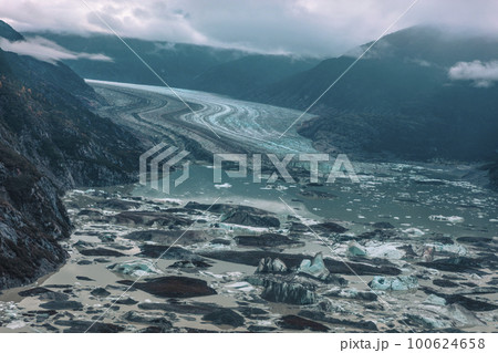 Glagier melting icebergs aerial helicopter tour view of Skagway excursion, Alaska, USA. Global warming and climate change concept Glagier melting icebergs aerial helicopter tour view of Skagway excursion, Alaska, USA. Global warming and climate change concept 100624658