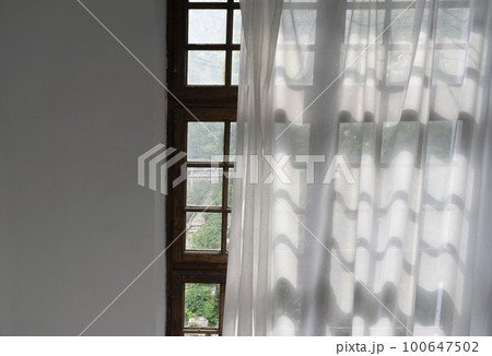 Close up of an abstract old interior window Close up of an abstract old interior window 100647502