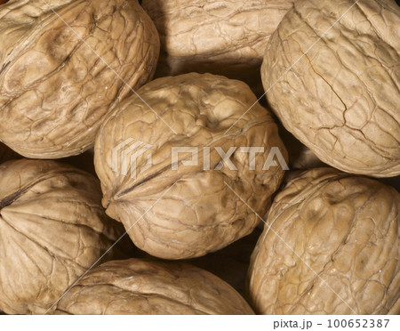 Whole walnuts as background 100652387