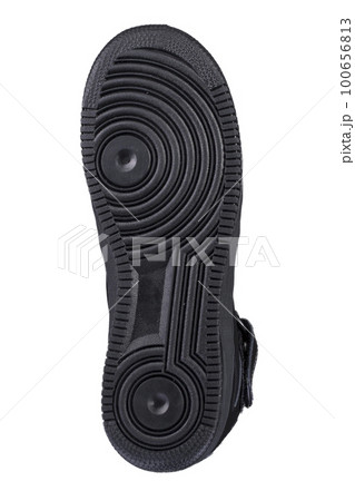 Black sole on a white background. Polyurethane sole Black sole on a white background. Polyurethane sole 100656813