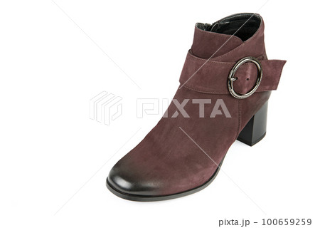 Beautiful female ankle boot isolated on white. Free space for text. 100659259
