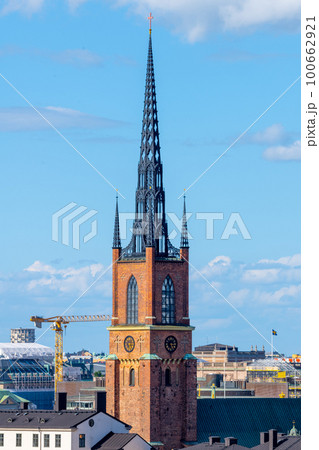 Pointed church tower on the island of Riddarholmen. Part of the former medieval abbey in Stockholm, Sweden. Burial site of most Swedish kings from the 17th century until 1950 Pointed church tower on the island of Riddarholmen. Part of the former medieval abbey in Stockholm, Sweden. Burial site of most Swedish kings from the 17th century until 1950 100662921