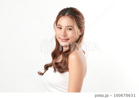 Beautiful young asian woman with clean fresh skin on white background, Face care, Facial treatment, Cosmetology, beauty and spa, Asian women portrait. Beautiful young asian woman with clean fresh skin on white background, Face care, Facial treatment, Cosmetology, beauty and spa, Asian women portrait. 100678631
