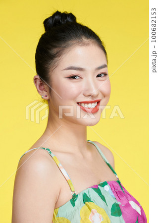 Portrait of young stunning model with bright impressive red lips 100682153