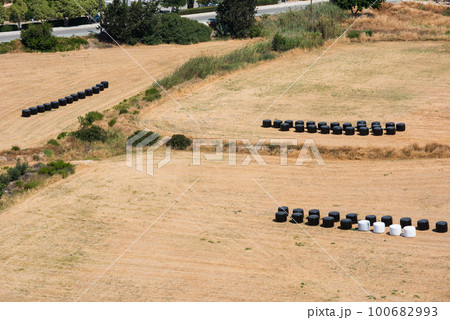 Strawbales in plastic wrap Strawbales in plastic wrap 100682993