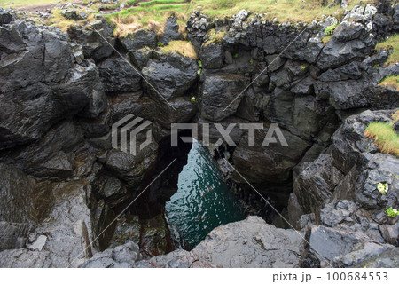 Arnarstapi basalt rock arch formation, Iceland 100684553