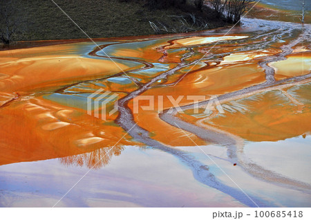 Pollution of a lake with contaminated water from a gold mine. 100685418