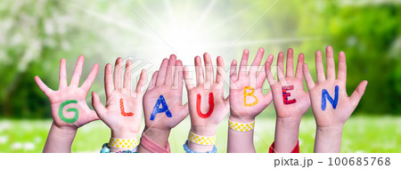 Children Hands Building Glauben Means Believe, Grass Meadow 100685768