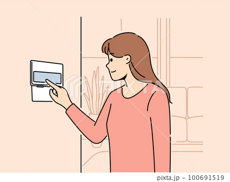 Woman using smart home system  100691519