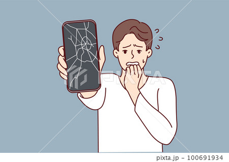 Man reacts to broken phone by bringing hand to mouth and experiencing shock due to breakdown 100691934
