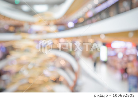 modern luxury shopping mall department store interior blur abstract defocused background with bokeh light 100692905