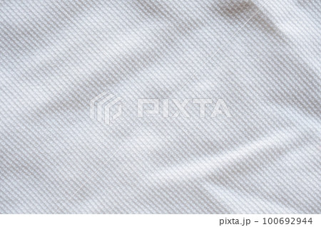White fabric sport clothing jersey texture background White fabric sport clothing jersey texture background 100692944
