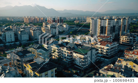 View of the city with modern houses. Aerial view from drone. Travel to Europe. View of the city with modern houses. Aerial view from drone. Travel to Europe. 100698435