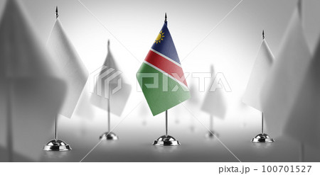 The national flag of the Namibia surrounded by white flags The national flag of the Namibia surrounded by white flags 100701527