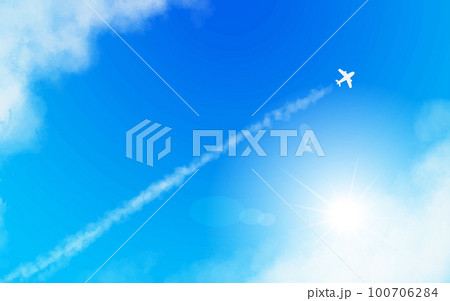 まっすぐのびた飛行機と飛行機雲　太陽 100706284