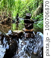 Balanced zen rock stacks in a creek. 100706870