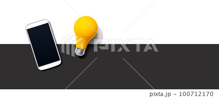 Smartphone with a yellow light bulb Smartphone with a yellow light bulb 100712170