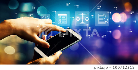 Legal advice service concept with person using smartphone 100712315